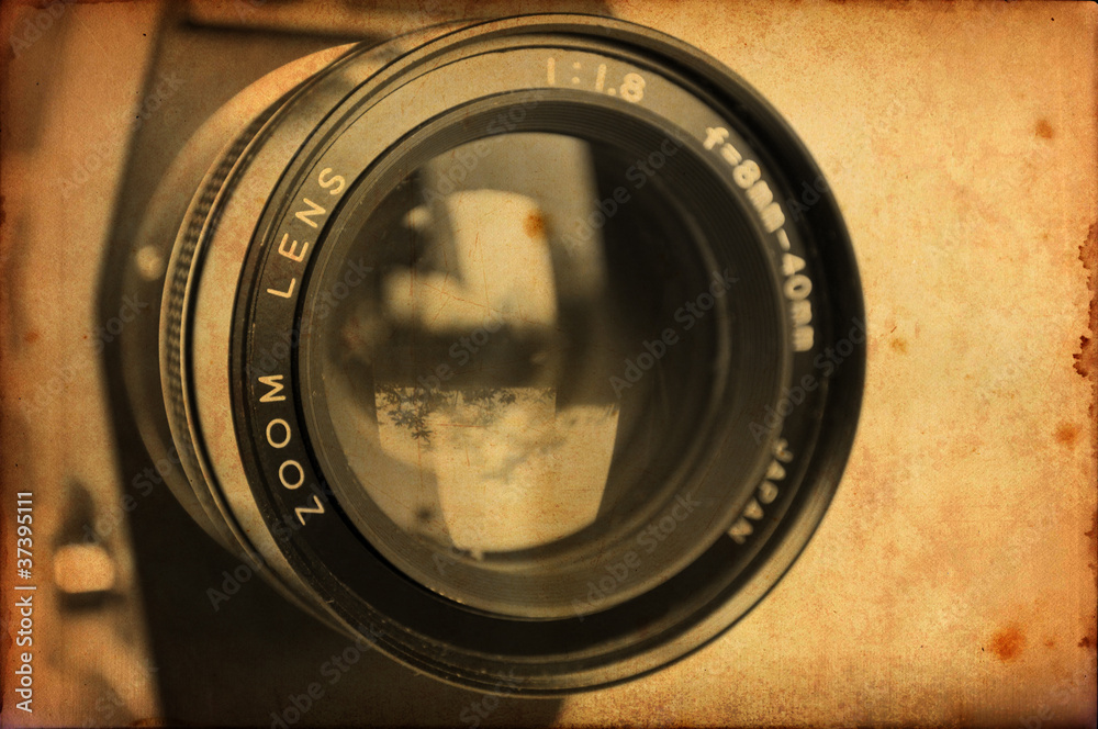 Antique camera with grunge paper texture