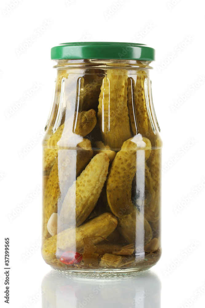 Marinated cucumbers in a glass jar isolated on white Marinated cucumbers in a glass jar isolated on white