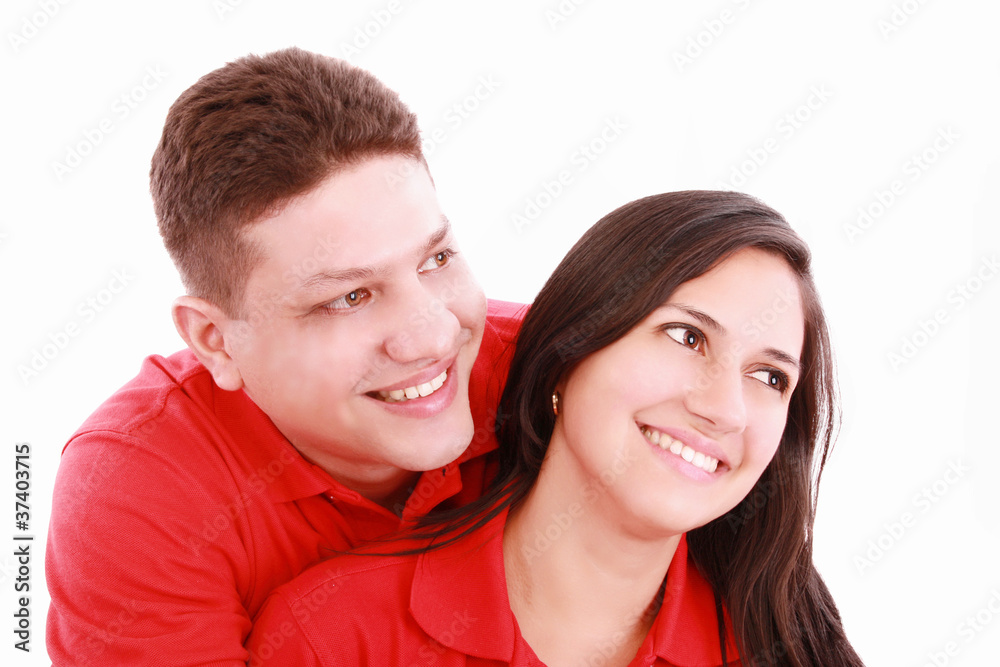 Portrait of a happy couple hugging each other and looking away - Portrait of a happy couple hugging each other and looking away -
