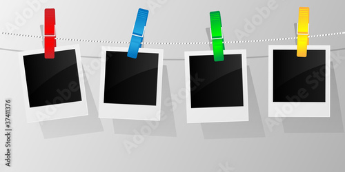 Blank photo frames on a clothesline