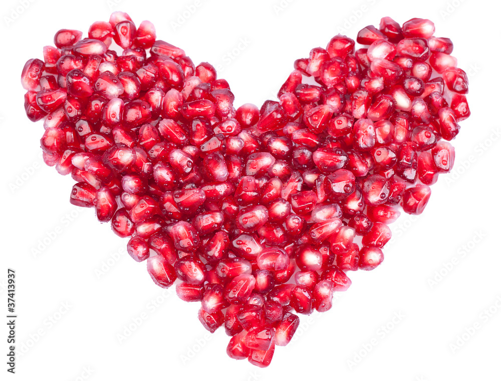 Shape of a heart made out of pomegranate seeds Shape of a heart made out of pomegranate seeds