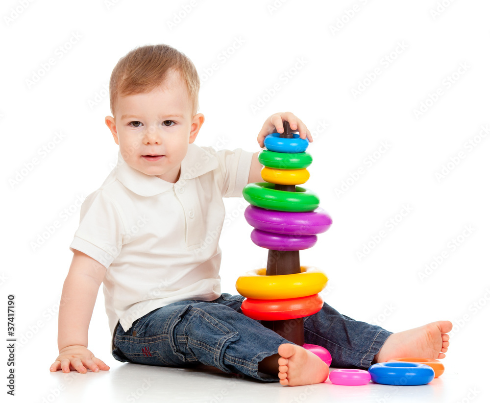 child playing with color pyramidion child playing with color pyramidion