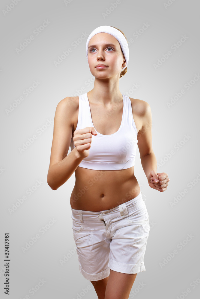 Young pretty woman in sport wear
