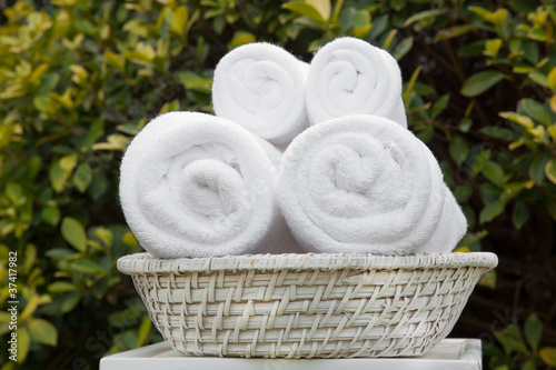 white towel in basket for spa