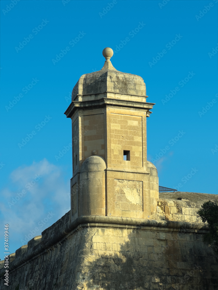 Watchtower Against Blue Sky in Valletta Watchtower Against Blue Sky in Valletta