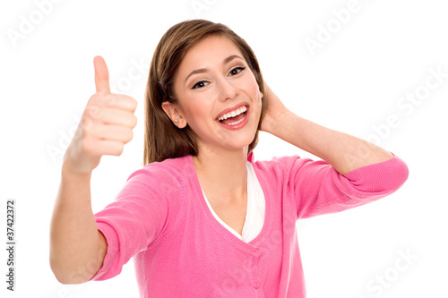 Young woman showing thumbs up