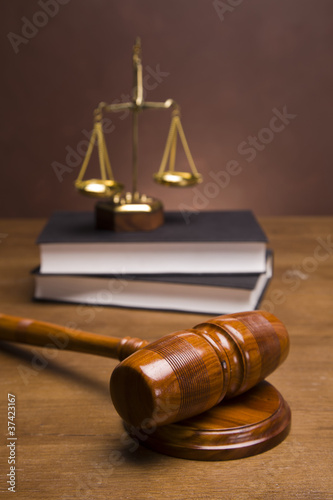 Gavel of justice and gavel on desk with dark background