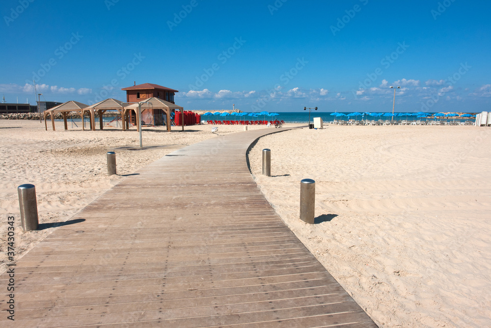 Walkway boardwalk to a perfect beach