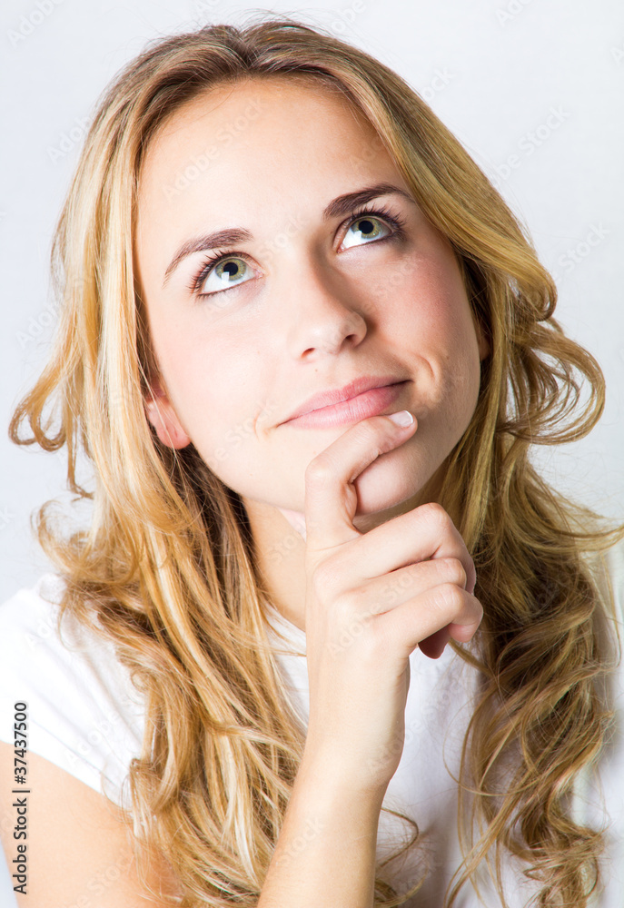 studio portrait of a beautiful blonde girl with expressions studio portrait of a beautiful blonde girl with expressions