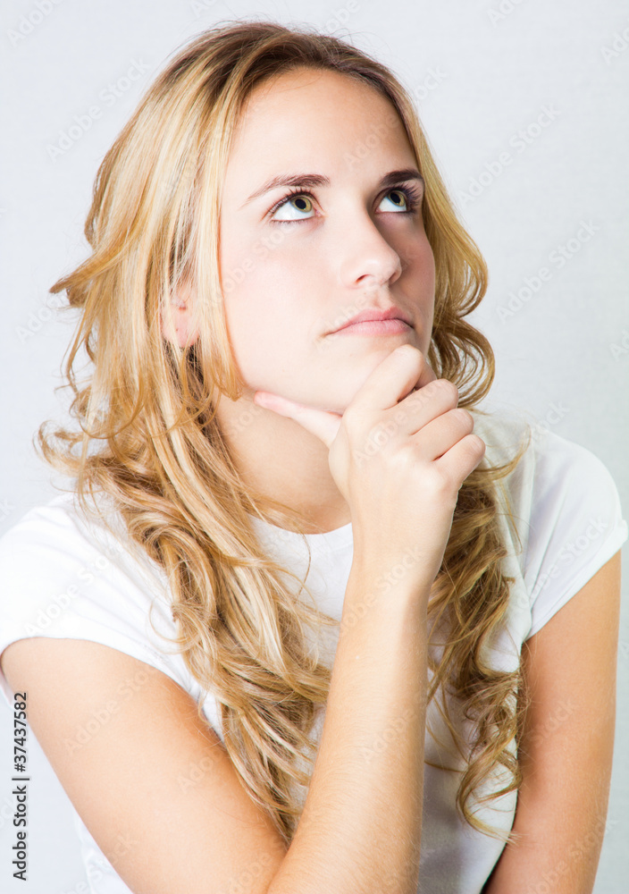 studio portrait of a beautiful blonde girl with expressions studio portrait of a beautiful blonde girl with expressions