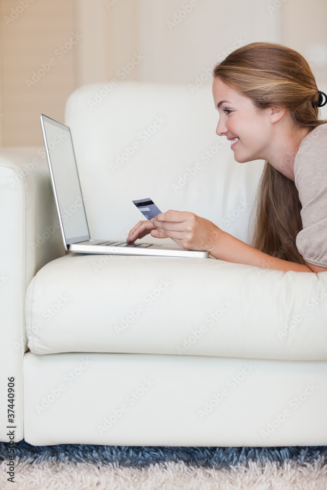 Portrait of a young woman shopping online Portrait of a young woman shopping online
