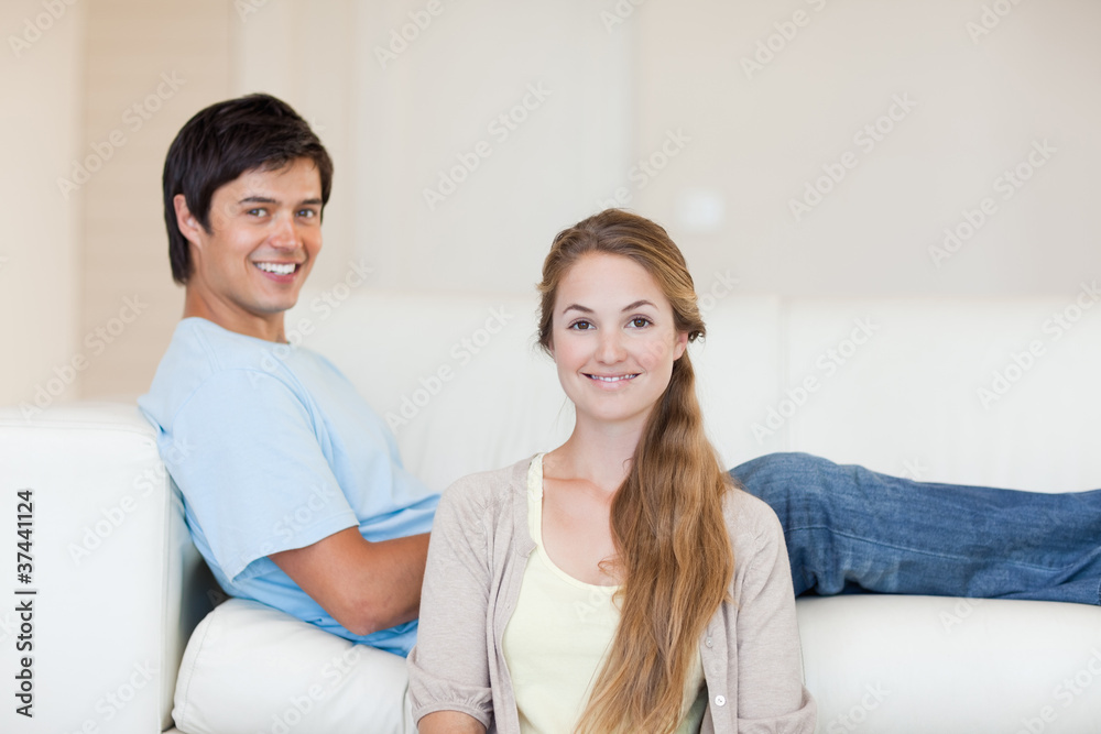Couple smiling at the camera Couple smiling at the camera