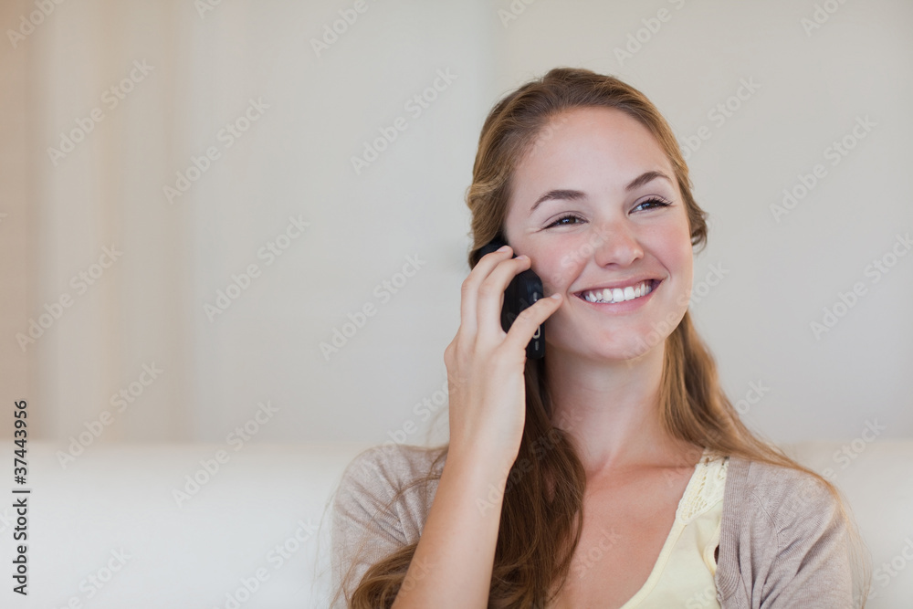 Woman enjoying her telephone conversation Woman enjoying her telephone conversation