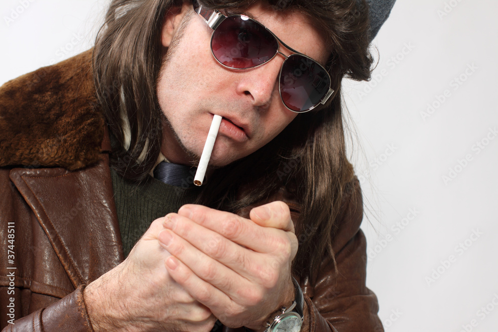 Man with mullet and cigarette. Man with mullet and cigarette.