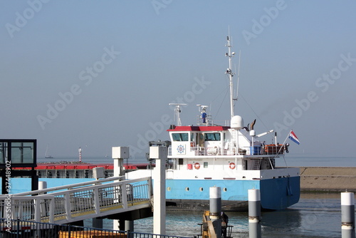 A boat at the pieri n Harlingen in the Netherlands photo