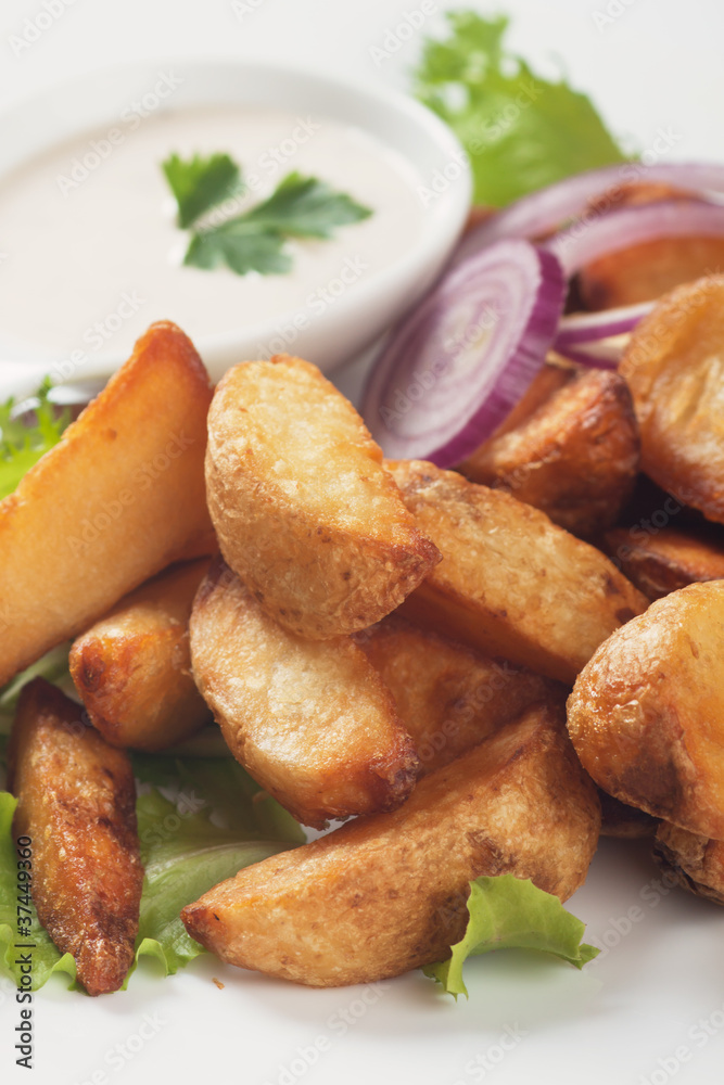 Fototapeta premium Fried potato wedges