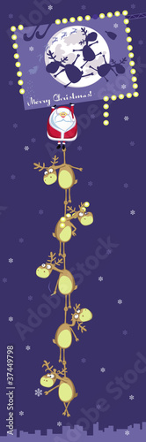 Santa with reindeers hanging on Christmas billboard