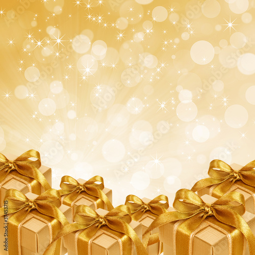 gold gift box on abstract gold Christmas background