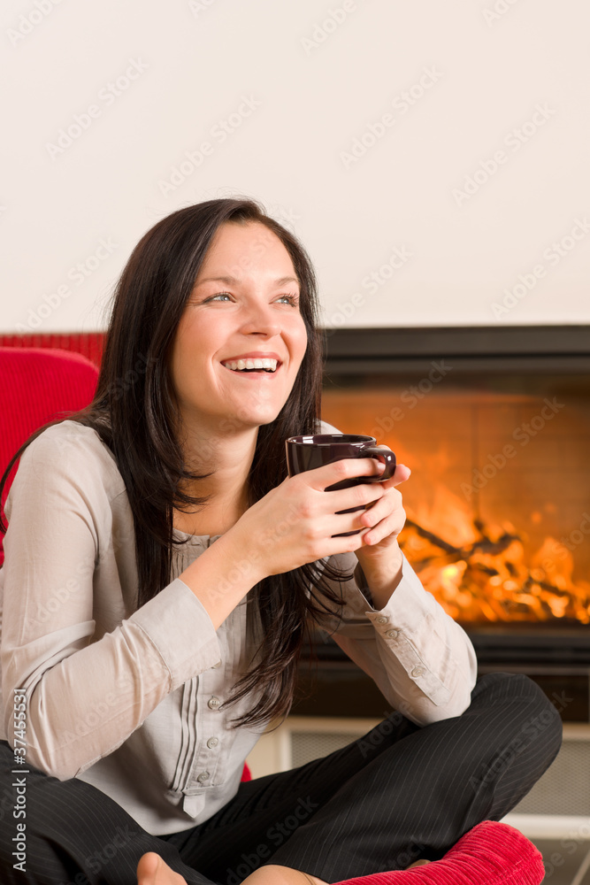 Winter home fireplace woman drink hot coffee Winter home fireplace woman drink hot coffee
