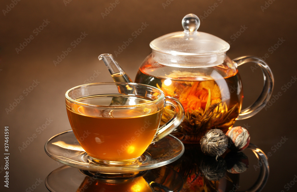 glass teapot and cup with exotic green tea glass teapot and cup with exotic green tea