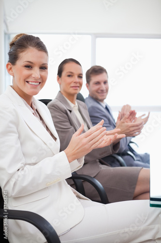 Side view of employees applauding © WavebreakmediaMicro