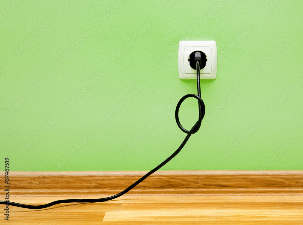 Electrical cable into the socket. Electrical cable into the socket.