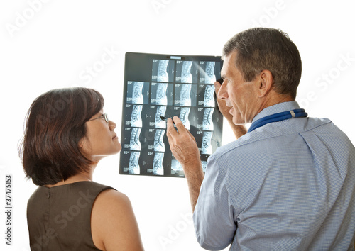 Doctor and Patient Viewing Spinal MRI Scans photo