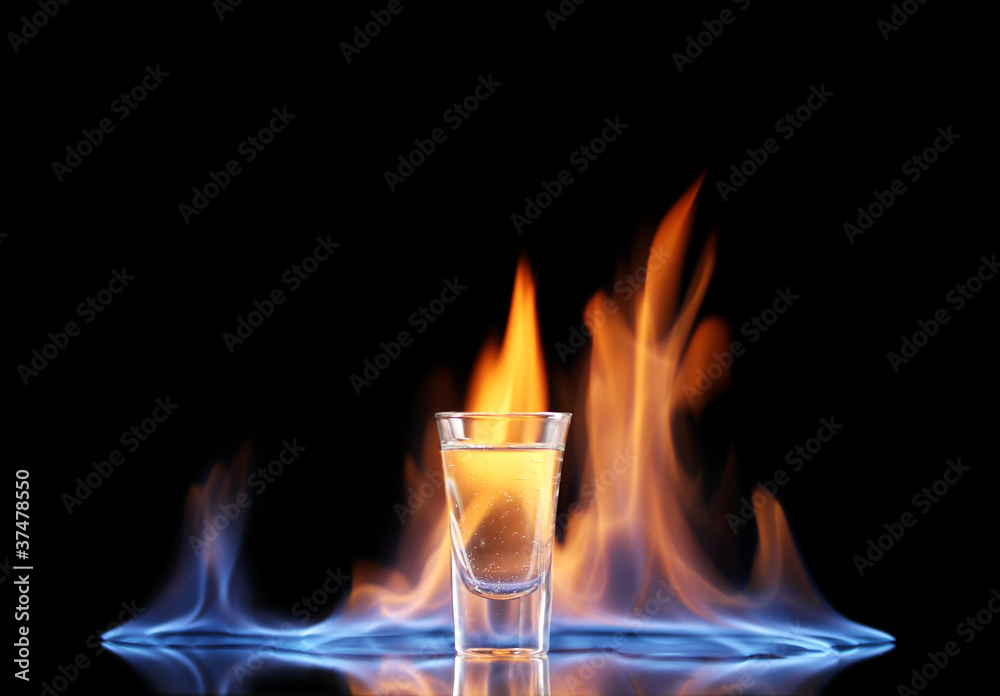 Flaming vodca on black background Flaming vodca on black background