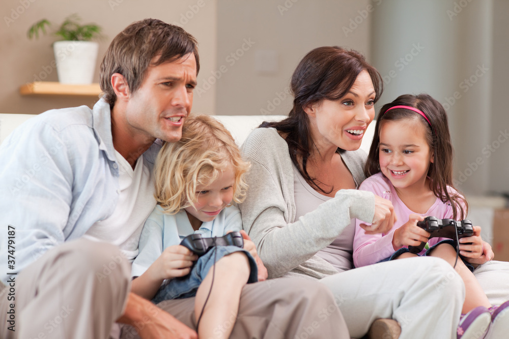 Competitive family playing video games together