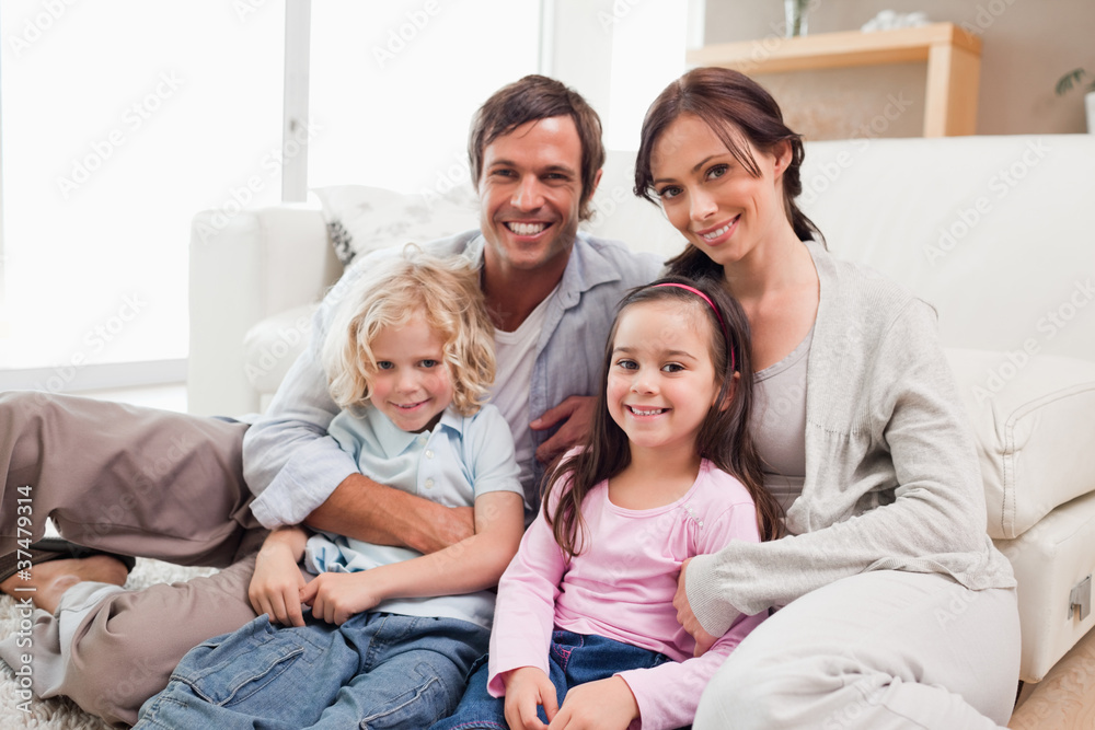 Family relaxing on a sofa