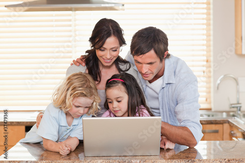 Family using a notebook together