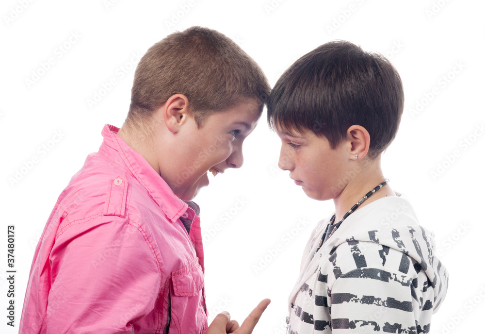 Two teenage boys arguing and screaming at each other Two teenage boys arguing and screaming at each other