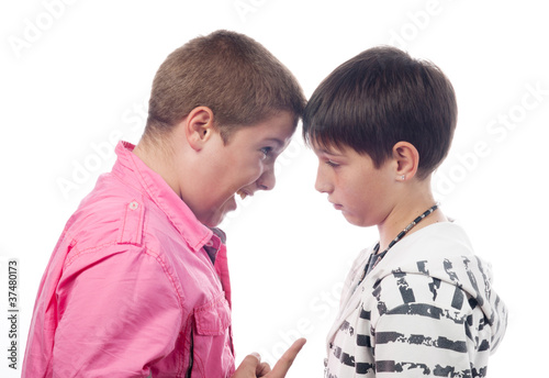 Two teenage boys arguing and screaming at each other