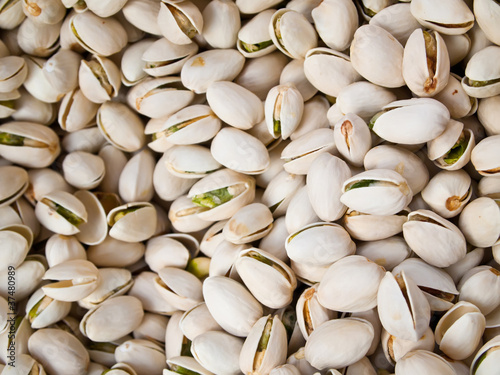 background of roasted pistachio nuts