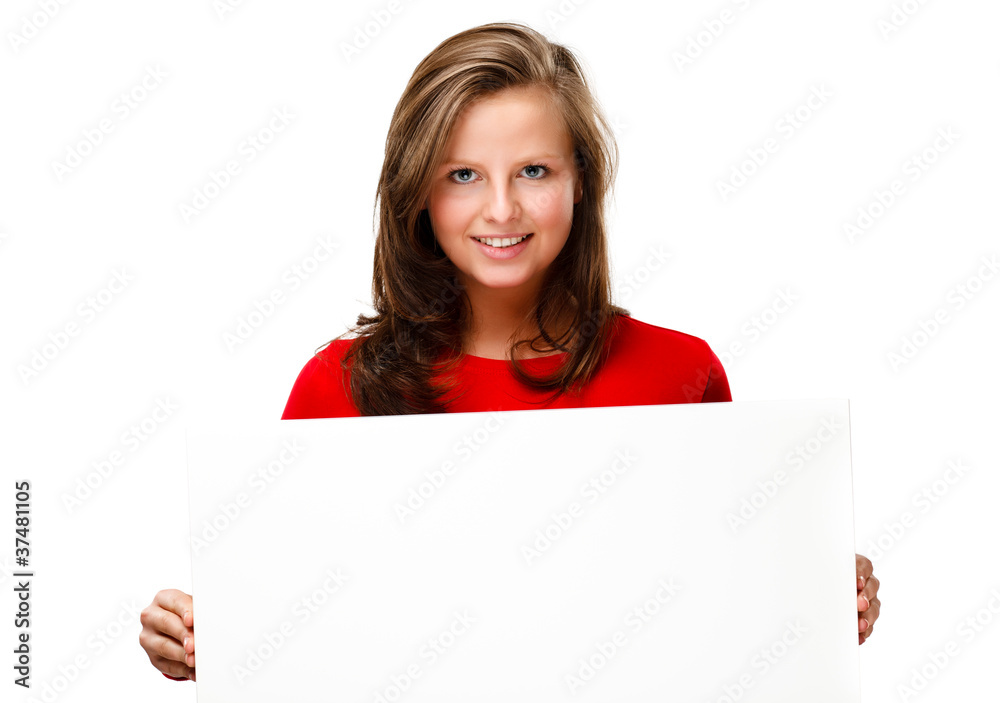 Young attractive girl behind empty board on white background Young attractive girl behind empty board on white background