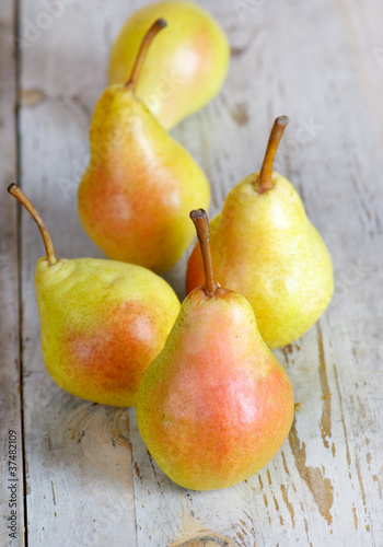 Pears on a wooden table