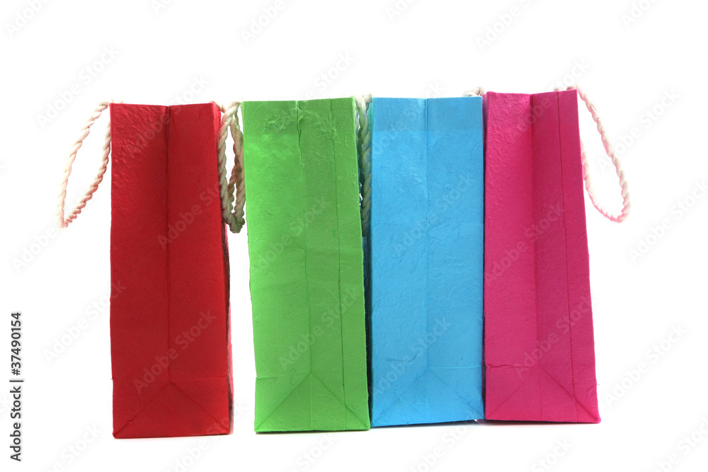 Colorful paper bag isolated in white background