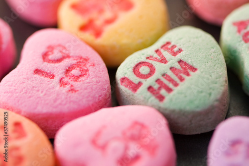 Close up shot of Valentines heart candy with message