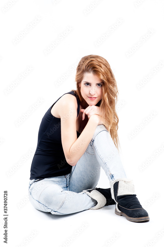 Sexy redhead on the floor looking at camera Sexy redhead on the floor looking at camera