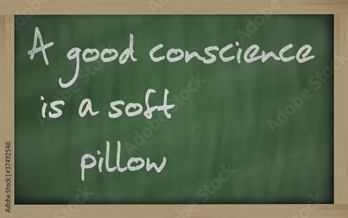 " A good conscience is a soft pillow " written on a blackboard