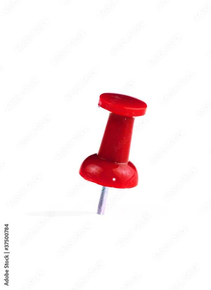 Cloue up of Red pushpin on white background Cloue up of Red pushpin on white background