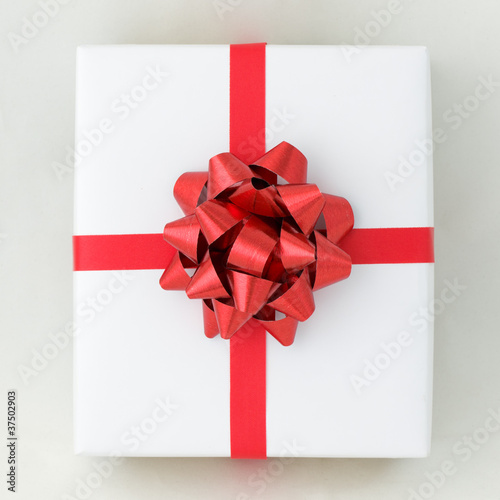 Top view of Red star and Cross line ribbon on White paper box