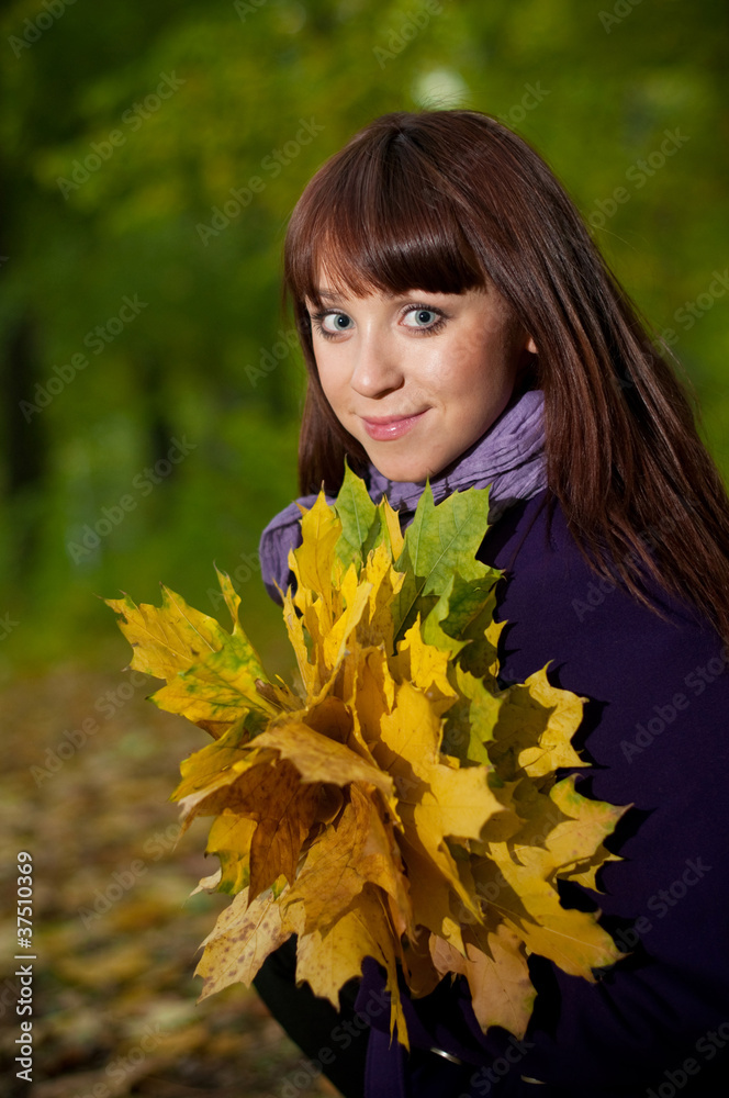 Beautiful smiling girl in park Beautiful smiling girl in park