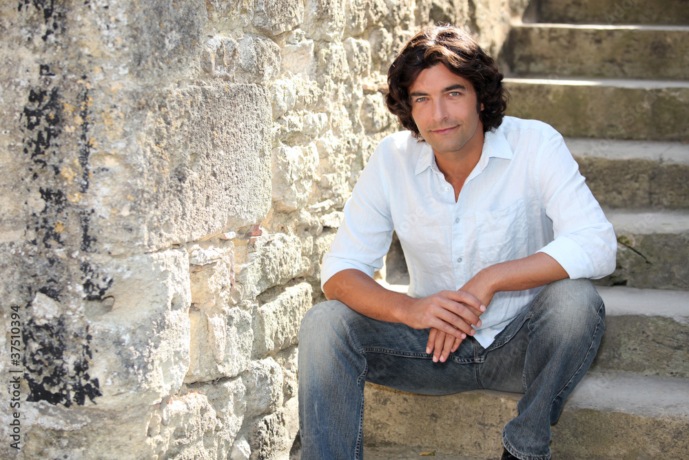 Man sitting on stairs