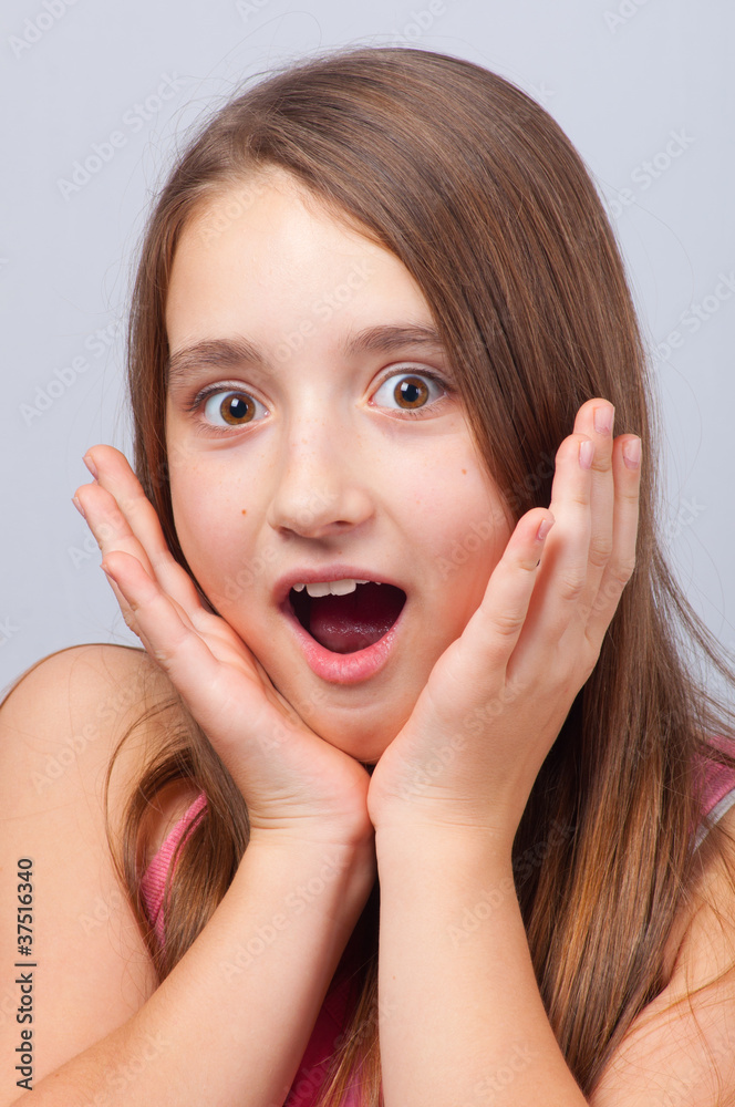Beautiful teenage girl with surprised look on her face Beautiful teenage girl with surprised look on her face