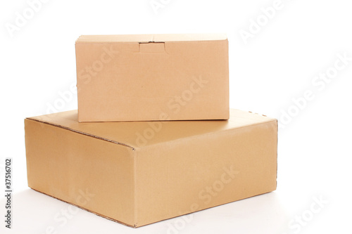 two closed cardboard boxes isolated on white