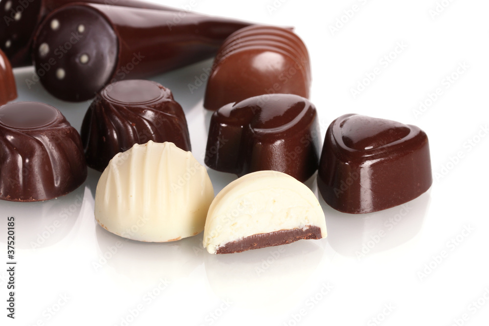 Many different chocolate candy isolated on white Many different chocolate candy isolated on white