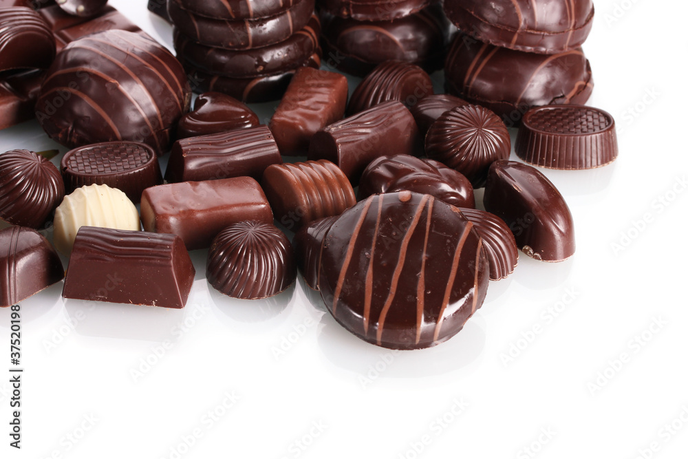 Many different chocolate candy isolated on white Many different chocolate candy isolated on white