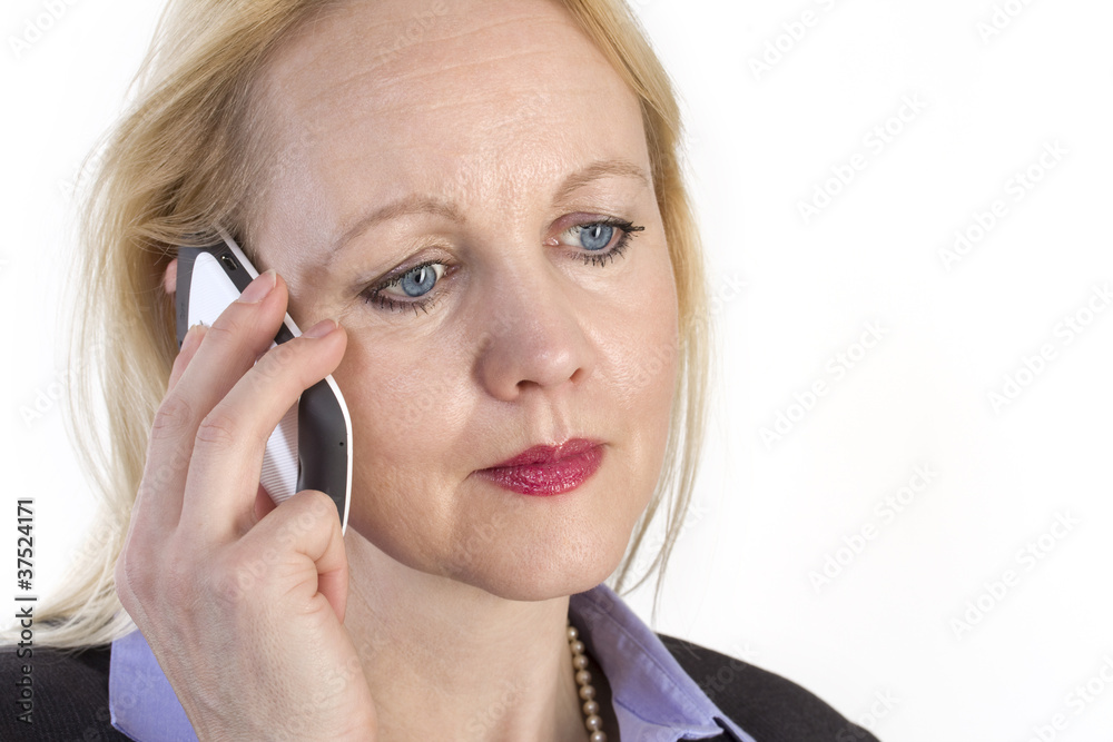 Portrait of an adult beautiful business woman speaking on a phon Portrait of an adult beautiful business woman speaking on a phon