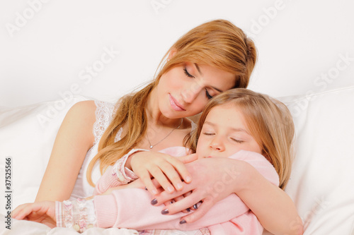 Mother and daughter sleeping